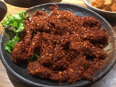 劲爆麻辣牛肉-吴氏老牌坊云南鱼豆花火锅店(通江街店)