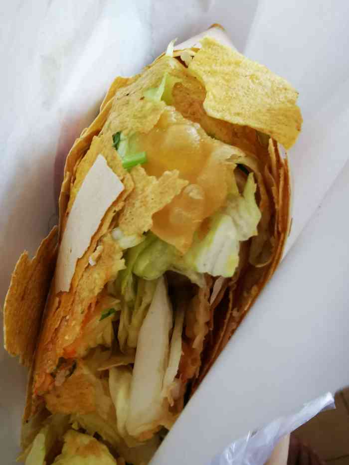 石磨煎饼(鼓楼店)-"今天来逛新民菜市场,看到一家石磨煎饼店前.