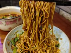 -爆炸头阿姨小四川正宗川味小吃(无任何分店)