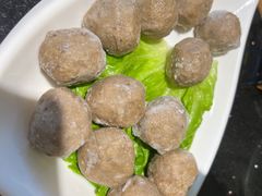 -明何记涮牛肚(品牌首店隋唐植物园南门古城路店)