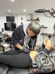 -龙之吻专业刺青·手工耳洞·纹身去色