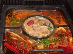 -老牌坊云南鱼豆花火锅(哈西万达店)