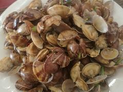 辣炒蛤蜊-1910老鲁味海鲜·戳子肉·青岛菜(金沙滩店)