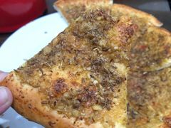 隔壁店的蒜蓉烤馕-清真·马峰烤肉(小学习北巷店)