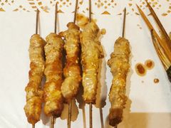 纯手工羊肉串-聚串门儿·东北烧烤(信义坊店)