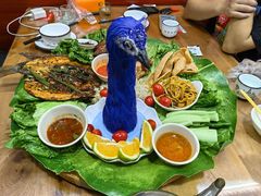 -沐毫傣泐云南菜孔雀宴•手抓饭傣味烧烤(曼听公园店)