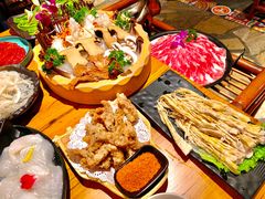 -老牌坊云南鱼豆花火锅(哈西万达店)