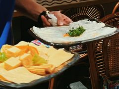 -老牌坊云南鱼豆花火锅(哈西万达店)