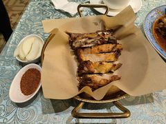 馕坑果木烤羊排-巴扎美食·新疆菜·西域歌舞表演餐厅(新疆大厦店)