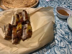 馕坑果木烤羊排-巴扎美食·新疆菜·西域歌舞表演餐厅(新疆大厦店)