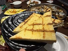 -曼听小寨海鲜烧烤·大连辣炒大王(盖州街店)