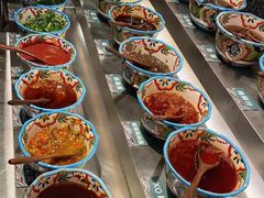 -老牌坊云南鱼豆花火锅(哈西万达店)