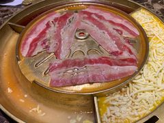 腌萝卜片-猪啊牛呀羊啊铜盘烤肉(正大广场店)