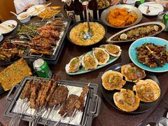 -曼听小寨海鲜烧烤·大连辣炒大王(盖州街店)