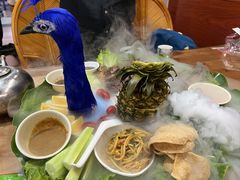 -沐毫傣泐云南菜孔雀宴•手抓饭傣味烧烤(曼听公园店)