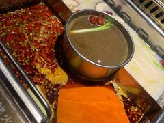 辣菌骨锅底-巴渝瓦肆重庆鲜火锅(宝龙环湖店)