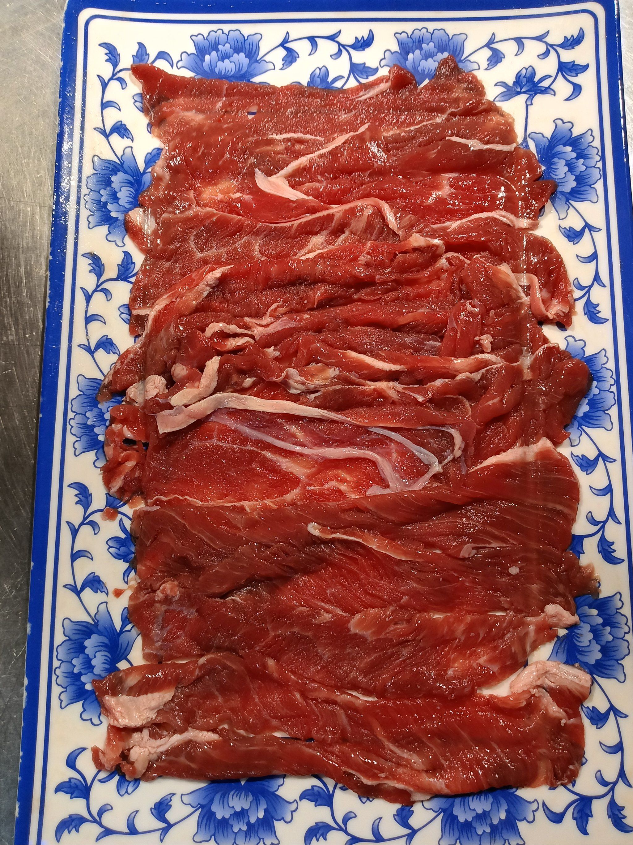 搭子火锅店的牛上脑,以其肉质鲜嫩多汁,纹