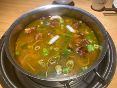 酸萝卜鸭架汤-守柴炉烤鸭(科华中路王府井店)