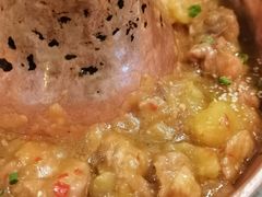 土司铜锅油焖鸡-浩海火烧云傣家菜(京广店)