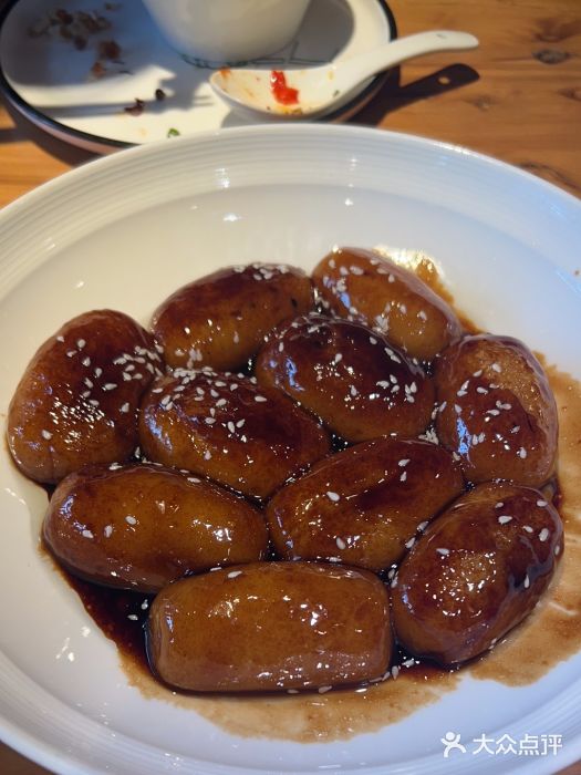 帅巴人舅母子腊蹄民俗村图片