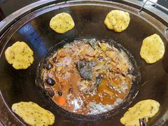 地锅小鸡炖蘑菇-许大亮淄博烧烤·自助鲜牛肉火锅(大江东宝龙店)