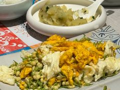 茉莉花炒鸡蛋-云海肴·汽锅鸡·云南代表菜(天山百盛优客店)