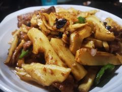 酸笋炒肉-堤边美食