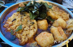 Pork Trotter, Intestine, and Snail Stew