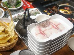 -老牌坊云南鱼豆花火锅(哈西万达店)