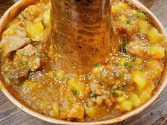 土司铜锅油焖鸡-浩海火烧云傣家菜(京广店)