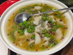 酸汤煮嫩滑鱼片-小大董·烤鸭(王府井apm店)