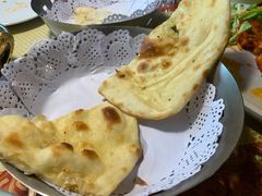 黄油馕饼-蓝孔雀美食(南岗店)