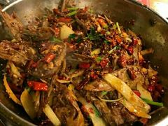 爆辣干锅鸭头-安诚居干锅鸭头(八角店)