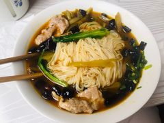 特色酸菜肉片米线-巴鑫田姐米线(巴南万达店)