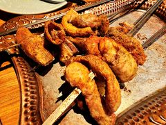 蒜子牛肠-阿里家·新疆烤肉酒場 by MIG