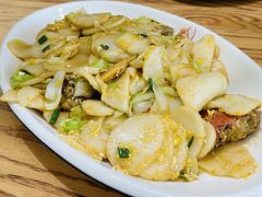 海鲜炒年糕-金海湾海鲜排档(朱家尖店)