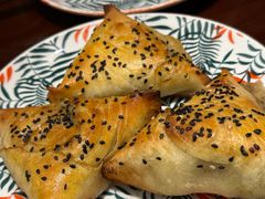 酥皮羊肉烤包子-那拉提之疆·新疆菜(美院店)