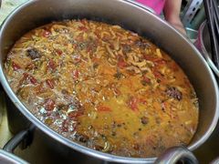 -梁老三麻辣鸡头总店