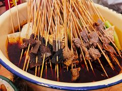 -拈签一笑黄牛肉辣卤串串