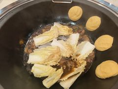 铁锅炖小鸡-冰城焰会大丰收铁锅炖(萝岗万达金街店)