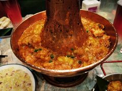 土司铜锅油焖鸡-浩海火烧云傣家菜(京广店)
