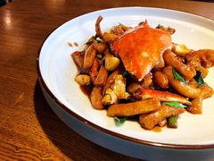 梭子蟹炒年糕-杭百味·大众精选杭帮菜(西湖音乐喷泉店)