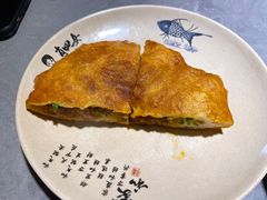 牛肉烤饼-肖四女乐山跷脚牛肉(江北星街坊店)