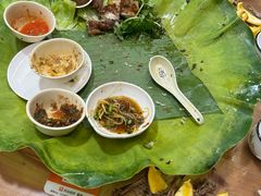 -沐毫傣泐云南菜孔雀宴•手抓饭傣味烧烤(曼听公园店)