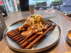 秘制牛小排-草家酱蟹炭火烤肉店(珲春南路一店)