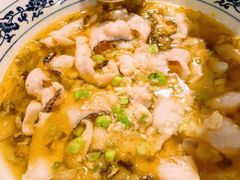 川味酸菜煮鲈鱼-麒麟中餐厅·经典粤菜·地道菜式老字号(广州长隆酒店)