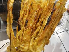 烤豆皮-喜悦小串丹东小黄牛海鲜烧烤大排档(民主广场店)