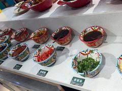 -老牌坊云南鱼豆花火锅(哈西万达店)