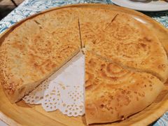 馕坑芝麻馕-巴扎美食·新疆菜·西域歌舞表演餐厅(新疆大厦店)