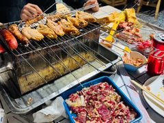-喜悦小串丹东小黄牛海鲜烧烤大排档(民主广场店)